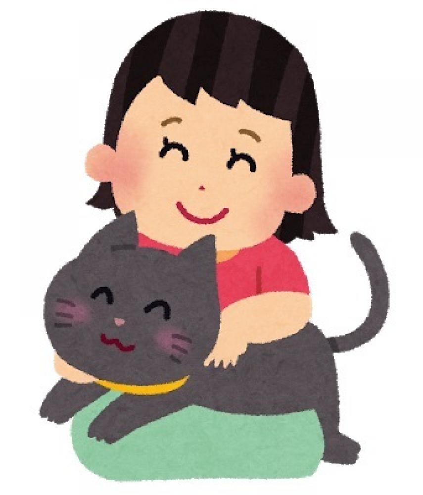 猫と女の子の画像です。