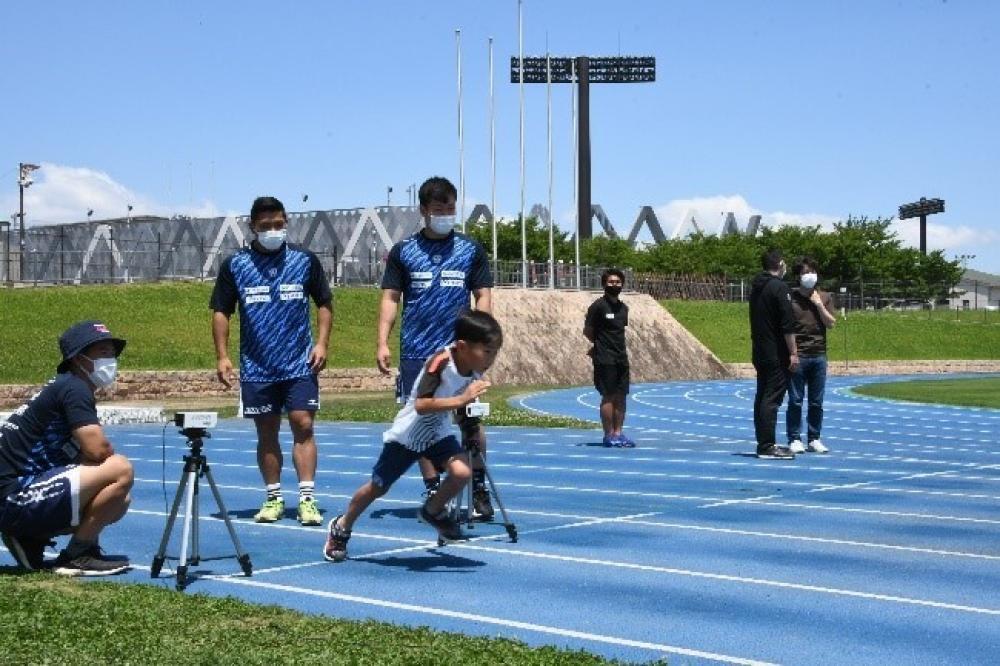 スポーツ競技の記録会の写真